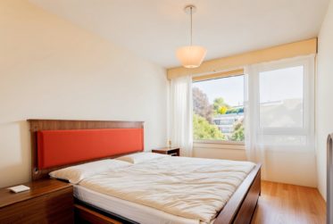 Spacious Apartment with Balconies in a Peaceful Residential Setting